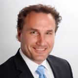 Zel Knezevic, Broker